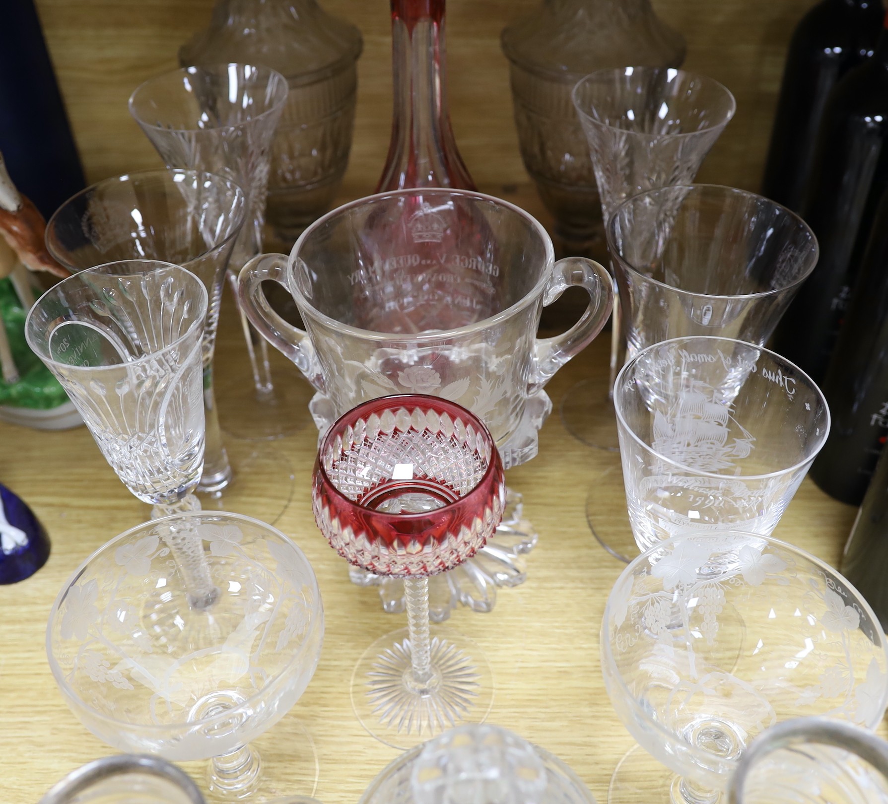 A pair of George III glass sweetmeat jars and covers, 31cm, a pair of silver-mounted tankards, Royal commemorative glassware, etc.